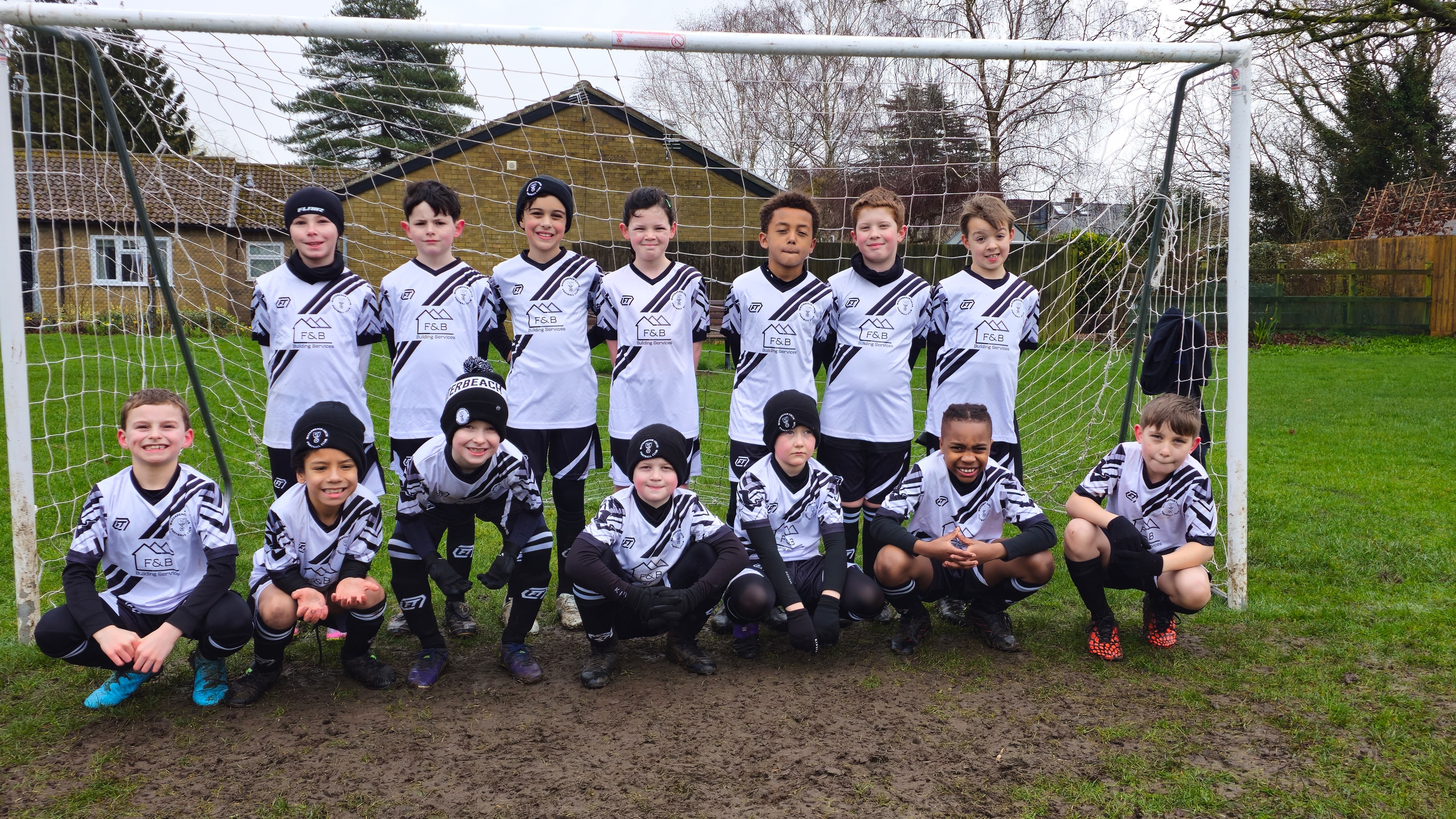 Football squad in custom FTACT match kits