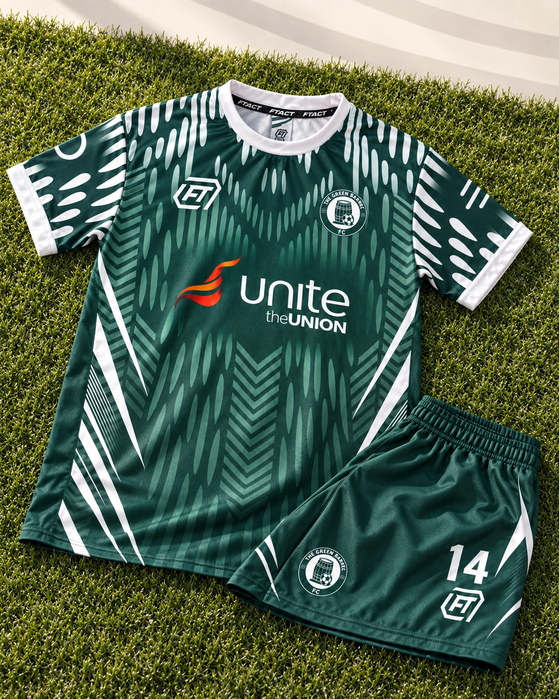 Green Barrel FC match kit laid out on sunlit green grass